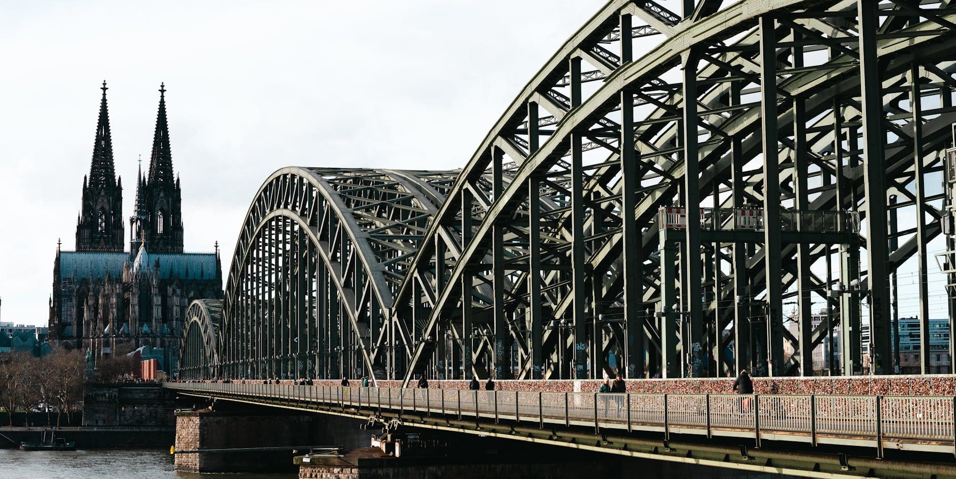 Iconic view of Hohenzollern Bridge with Cologne Cathedral in Cologne, Germany.